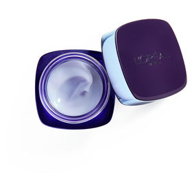 Nighttime routine scene with Revitalift Renew suggesting refreshed skin.