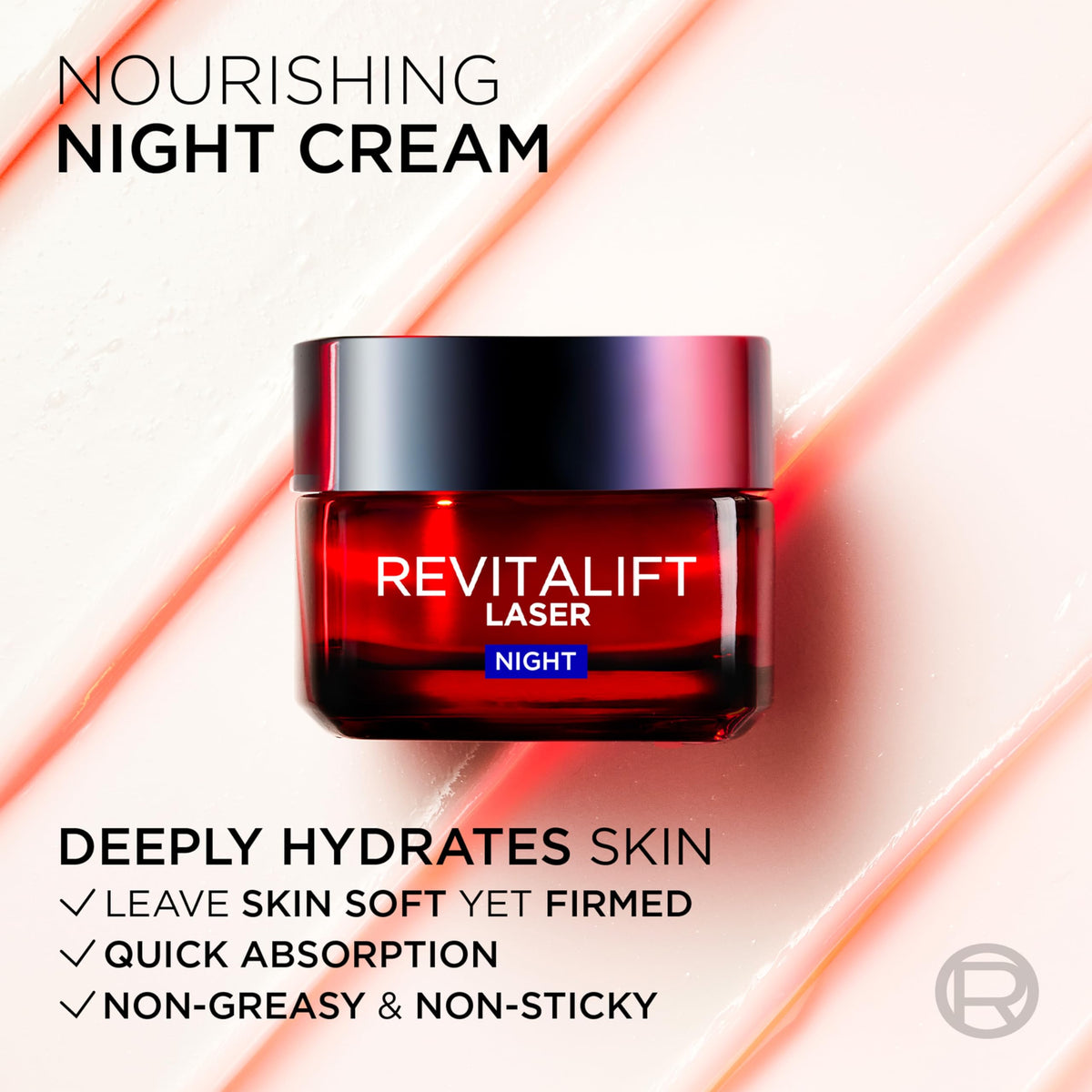 Night-time routine mood with the jar beside a soft blanket featuring L'Oreal Paris Revitalift Laser Renew Night Cream.