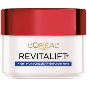 Close-up of Revitalift night cream texture highlighting smooth, creamy formula.