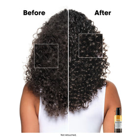 L’Oréal Professionnel Absolut Repair Bi-phase Oil texture close-up emphasizes smoothness.