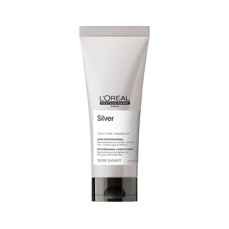 L’Oréal Professionnel Paris Color Depositing Purple Conditioner bottle neutralizes brassiness