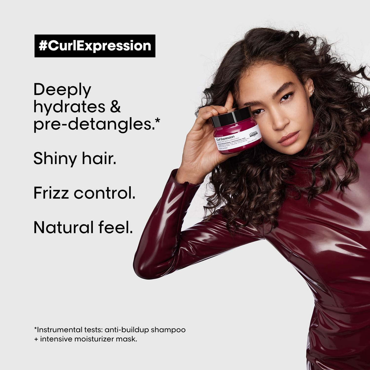 L’Oréal Professionnel Paris Curl Expression Rich Mask hair-closeup highlighting hydrated, glossy curls.