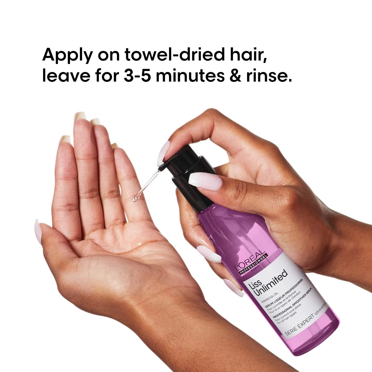 L'Oréal Professionnel Paris Liss Unlimited Serum smoothing hair for easier brushing.