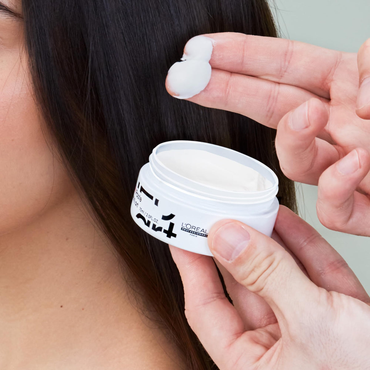 L’Oréal Professionnel Paris Styling Fix Paste matte finish close-up on styled hair.