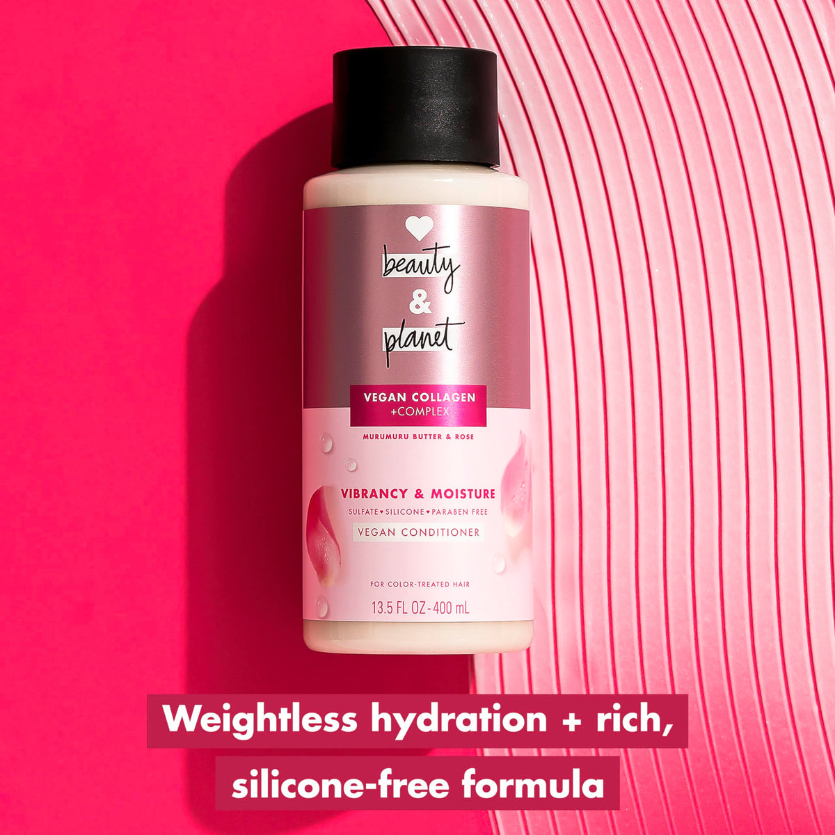 Applying Love Beauty And Planet conditioner from mid-lengths to ends for detangling