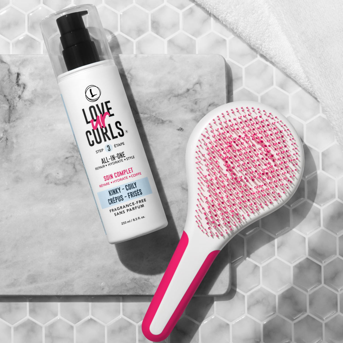 Love Ur Curls tube close-up highlights rich shea butter and moringa oil benefits.