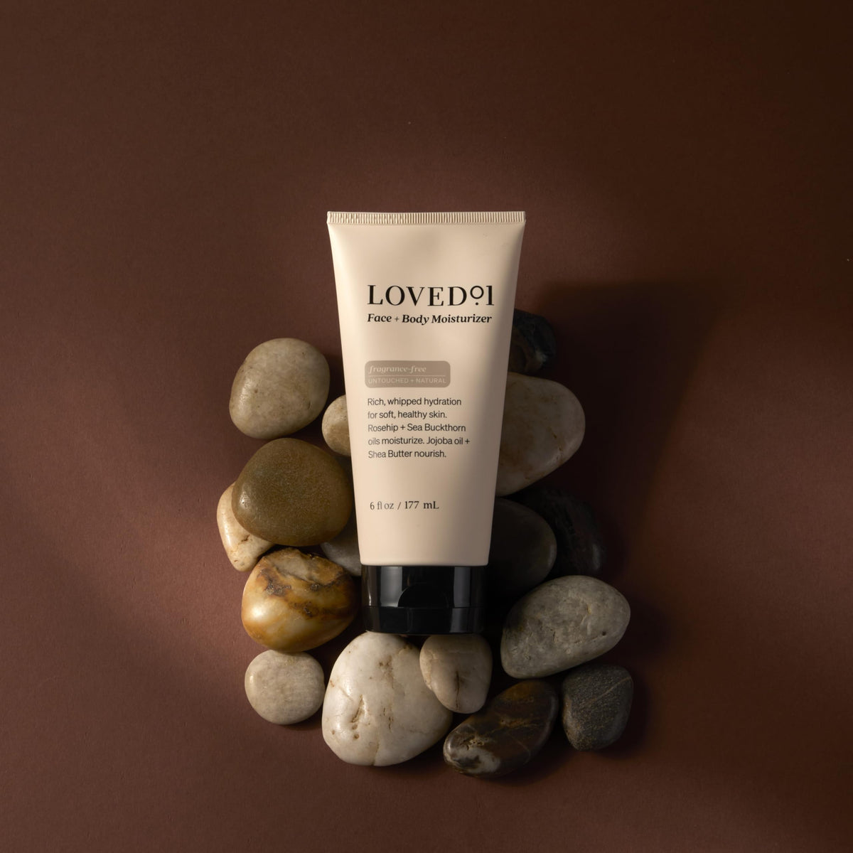 Loved01 Daily Face & Body Moisturizer applied to the face demonstrates quick absorption