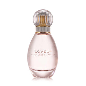 Lovely by SJP EDP bottle pour highlighting citrus and musk for everyday elegance.
