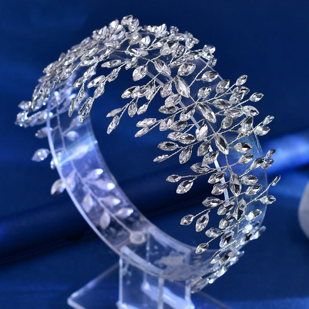Lovfoiver sparkling crystal headband creates a romantic bridal look.