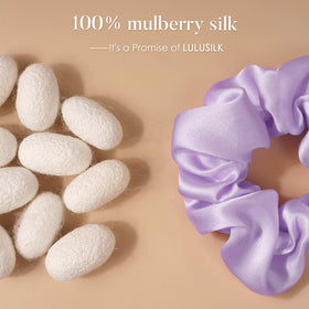 LULUSILK silk scrunchies in a bedtime scene, staying comfortable while you sleep.