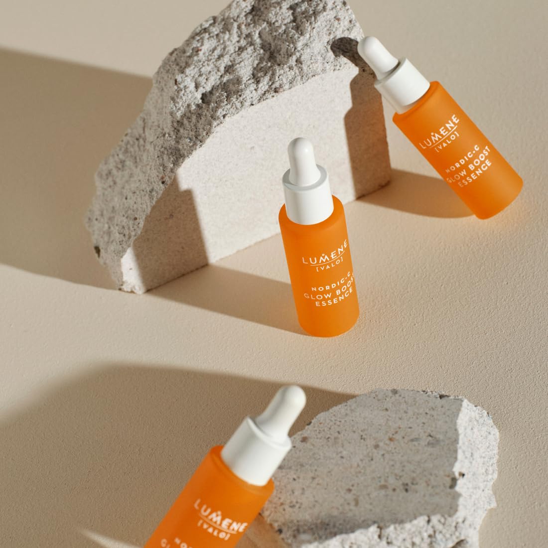Lumene Glow Boost Serum being applied to the skin for a dewy finish.