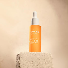 Close-up of Lumene Glow Boost Serum droplets illustrating hydration.