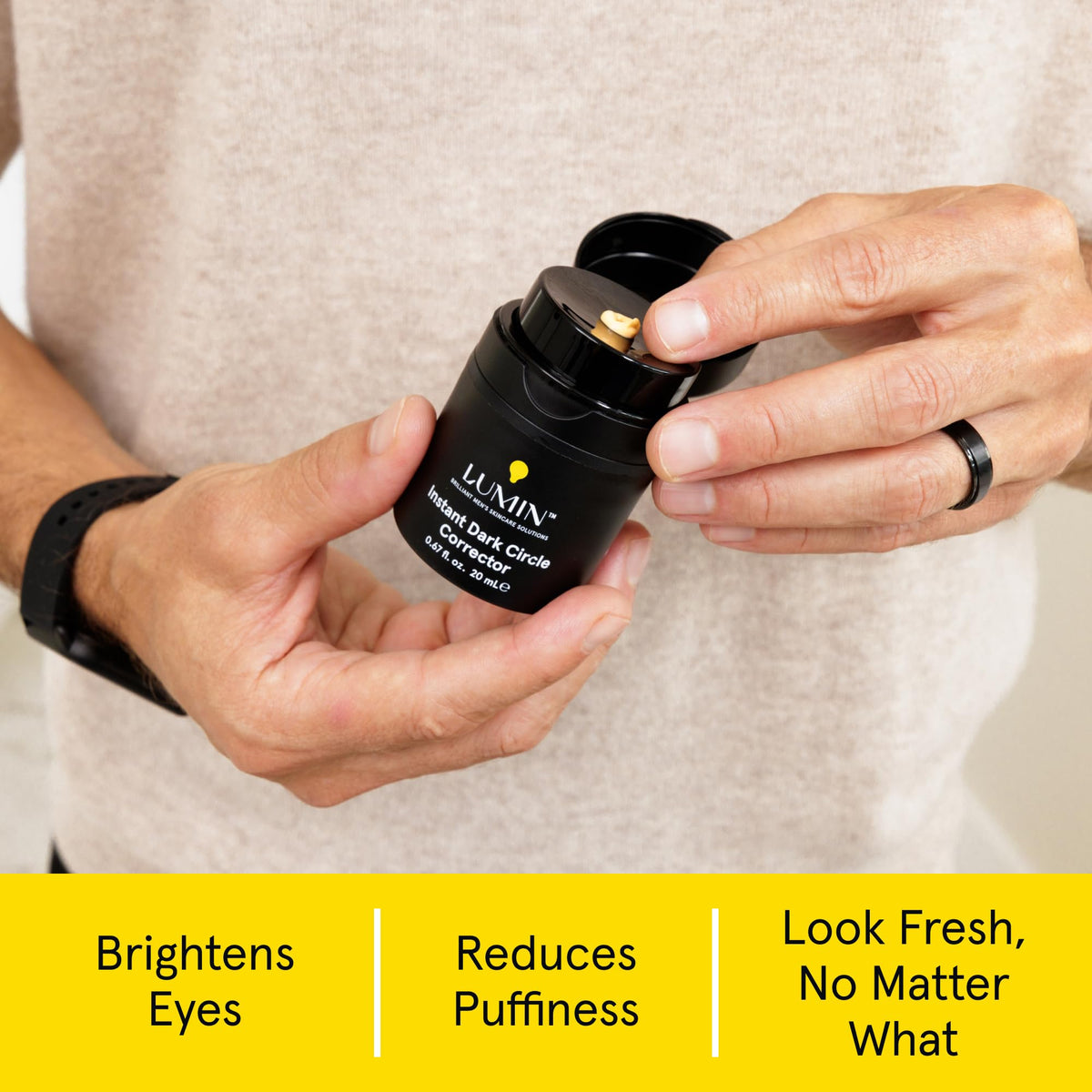 Lumin Instant Dark Circle Corrector for Men application close-up demonstrates creamy texture for color correction.