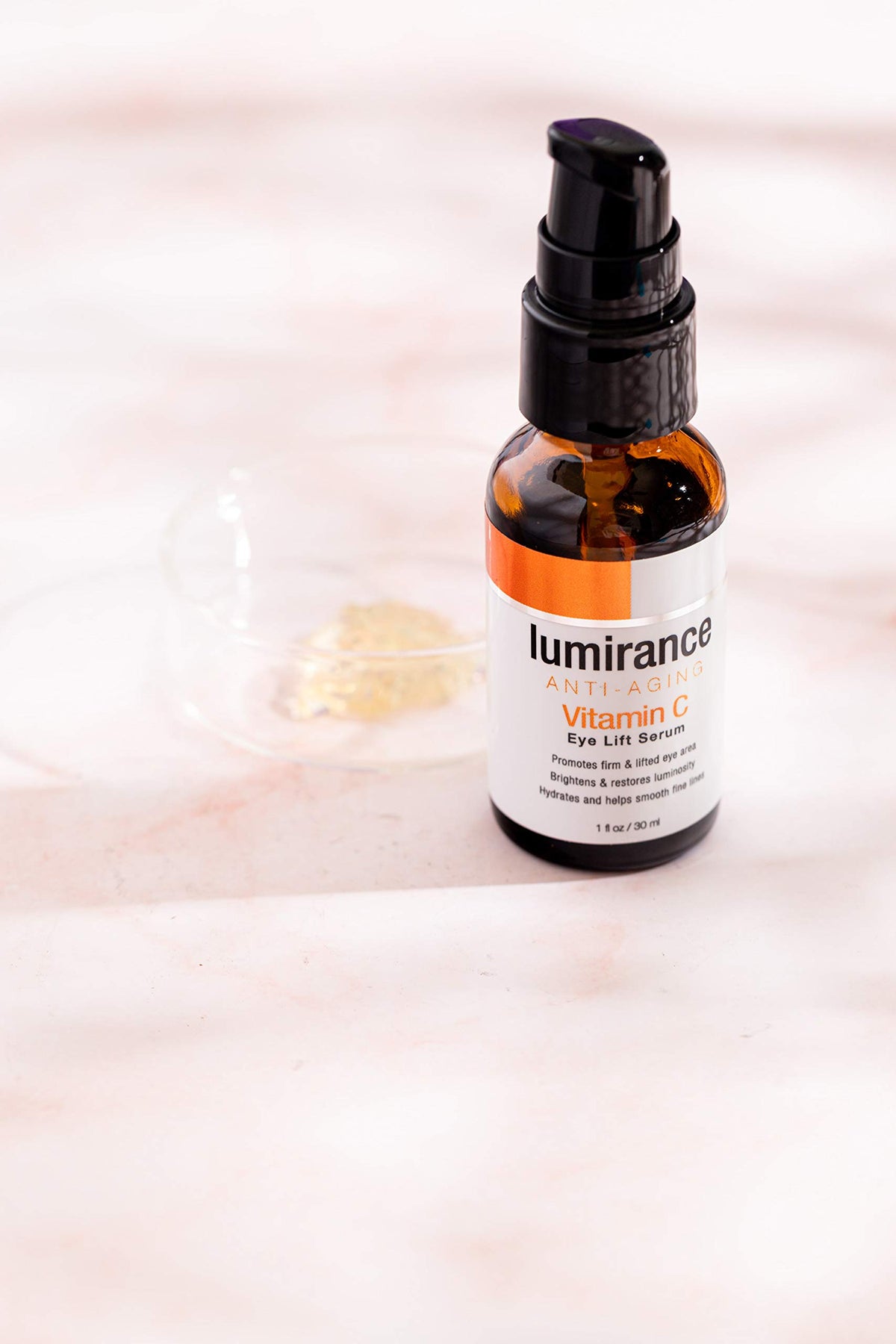 Lumirance Eye Lift Serum texture closeup showing a lightweight, hydrating formula for the eye area.