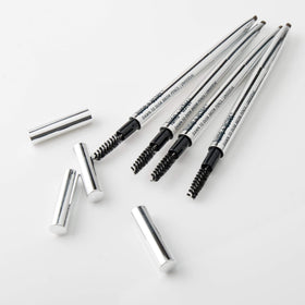 Lune+Aster Brow Pencil with built-in spoolie for quick blending and grooming.