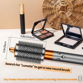 Luresta brush in use on damp hair demonstrates smooth detangling.