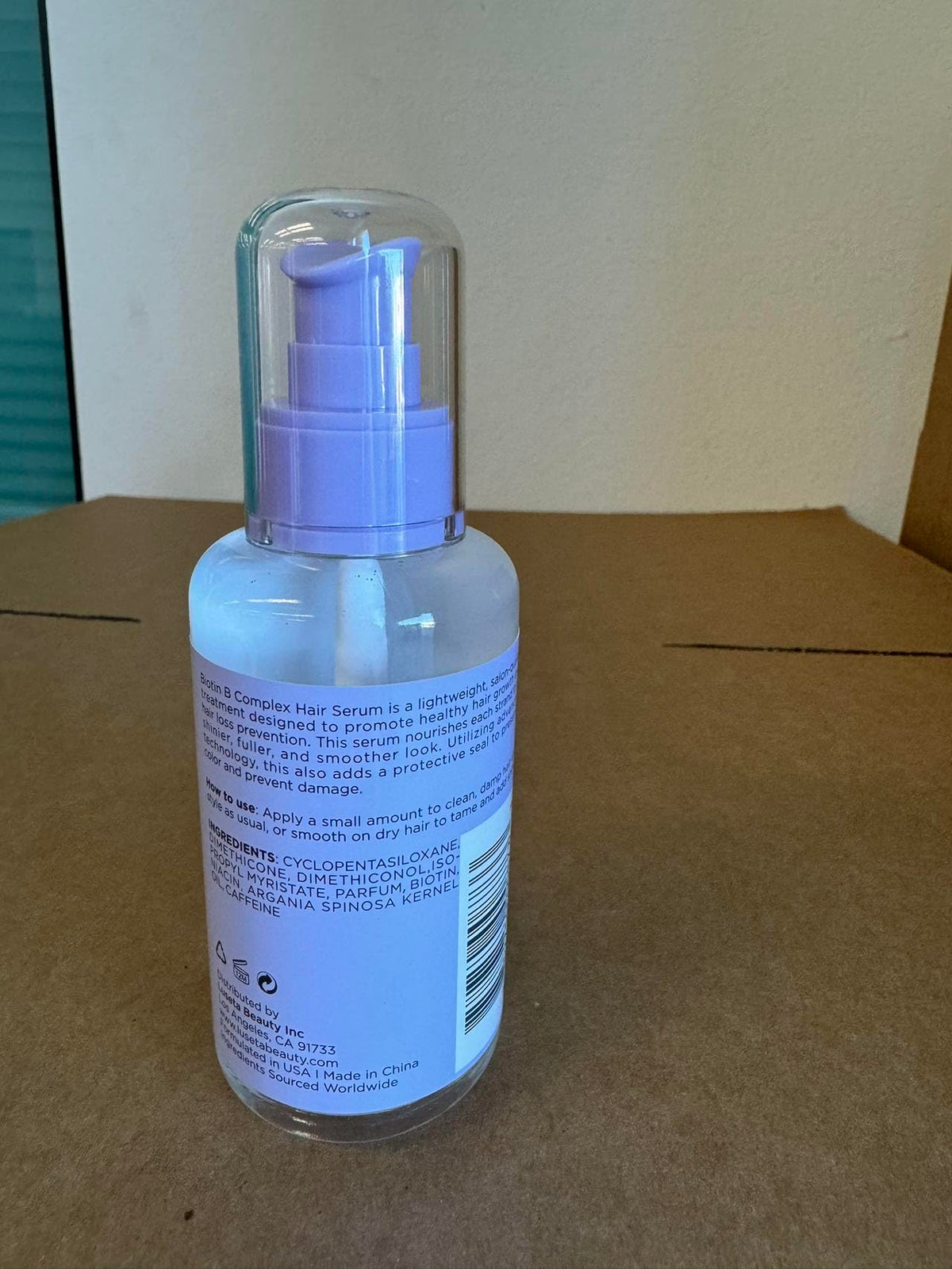 Luseta Biotin B-Complex Hair Oil countertop display highlighting convenient nourishing care.