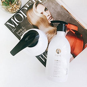 Luseta Marula Oil hair gloss close-up captures natural shine and moisture.