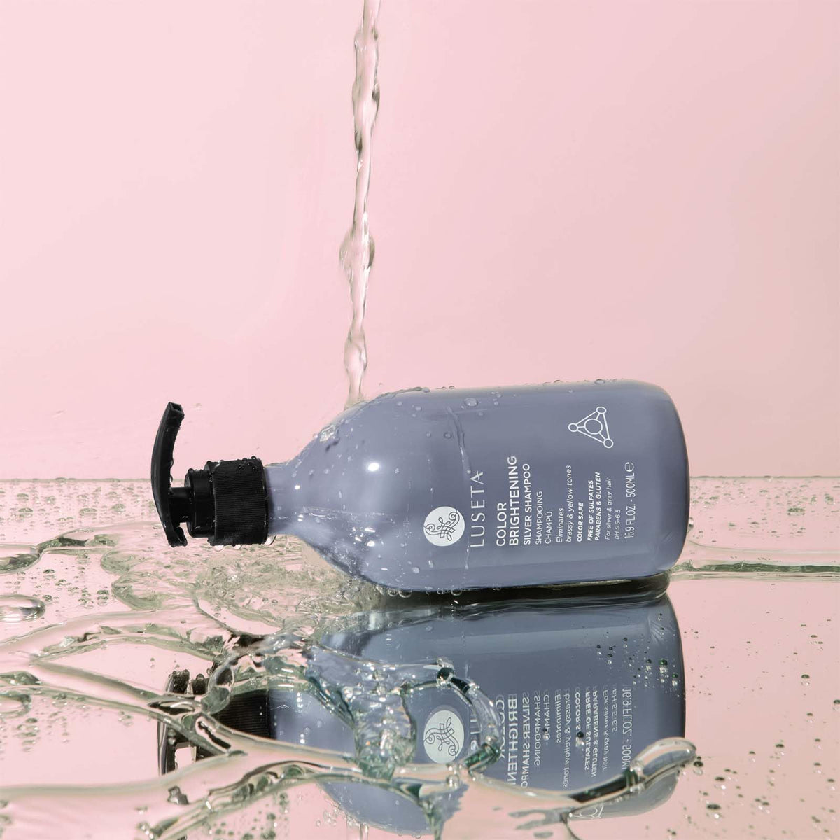 Close-up of silver hair after use with reduced brassiness and cooler hue from Luseta