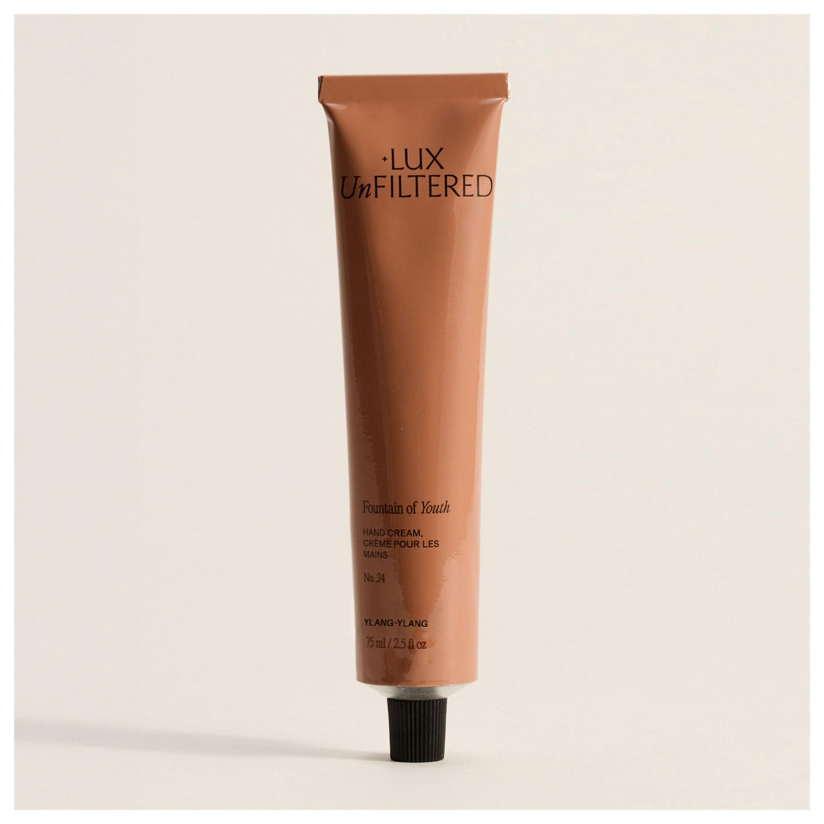 Lux Unfiltered N°24 bottle pour showing easy, mess-free hand hydration.