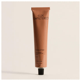 Lux Unfiltered N°24 bottle pour showing easy, mess-free hand hydration.