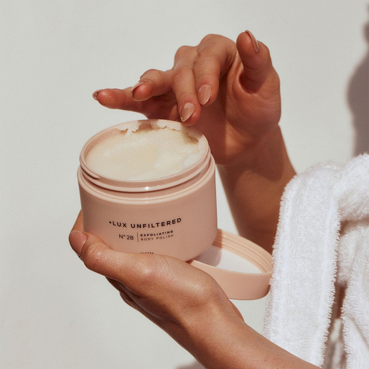 Wet skin after use shows hydrated softness from Lux Unfiltered N°28 scrub