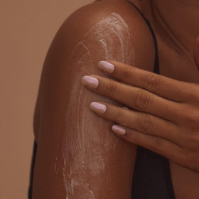 Lux Unfiltered packaging beside key ingredients like shea butter and jojoba.