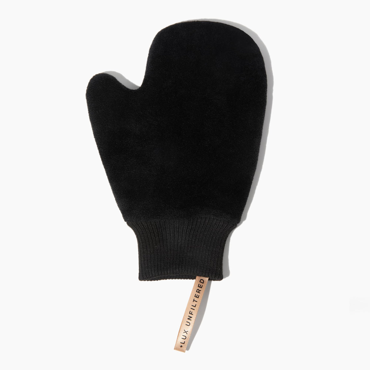Lux Unfiltered self tanning mitt microfiber glove for a smooth, streak-free application.