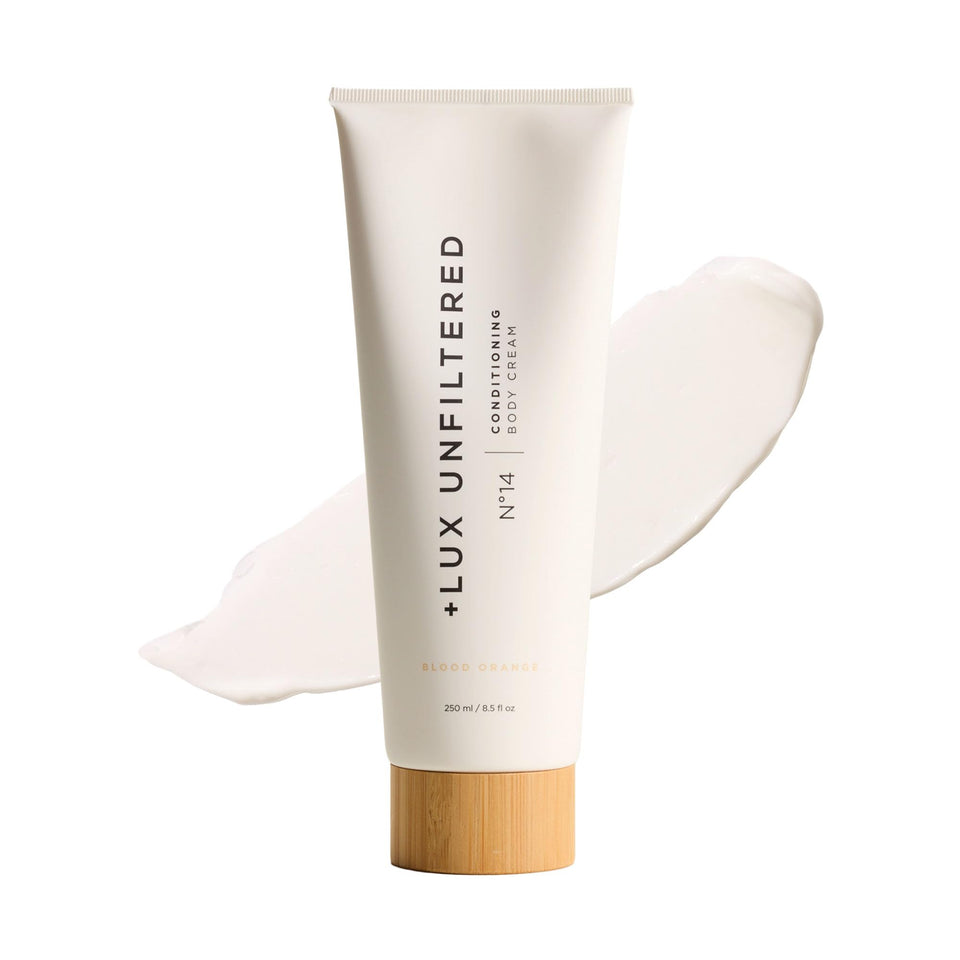 Lux Unfiltered Tall Pour N14 bottle showing hydrating formula for smooth, non-greasy skin.