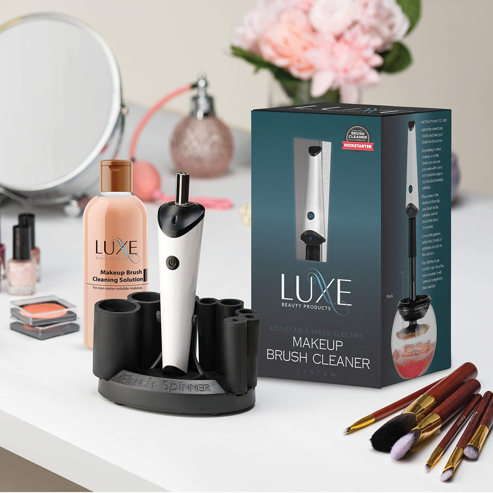 Luxe electric makeup brush cleaner on docking station for quick, hygienic cleaning
