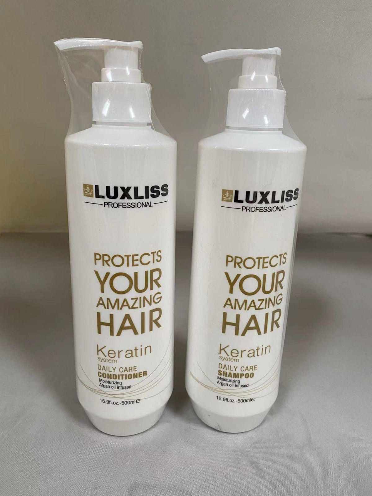 Luxliss keratin daily care conditioner bottle for hydrated, frizz-free results.
