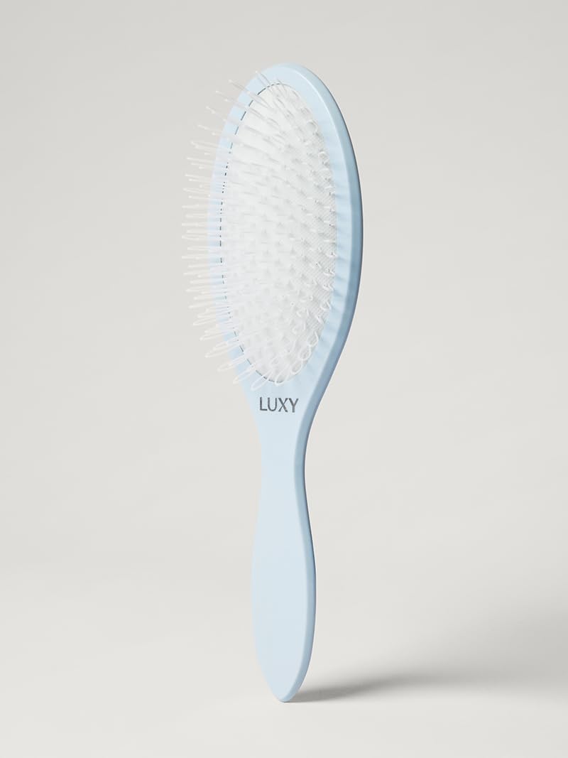 Luxy Loop Extensions Brush anti-static nylon bristles glide through extensions for smooth detangling