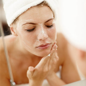 m-61 Microdermabrasion scrub application showing circular massage technique