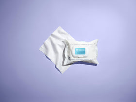 m-61 Perfect Cleansing Cloths being used on face: refreshing cleanse after makeup.