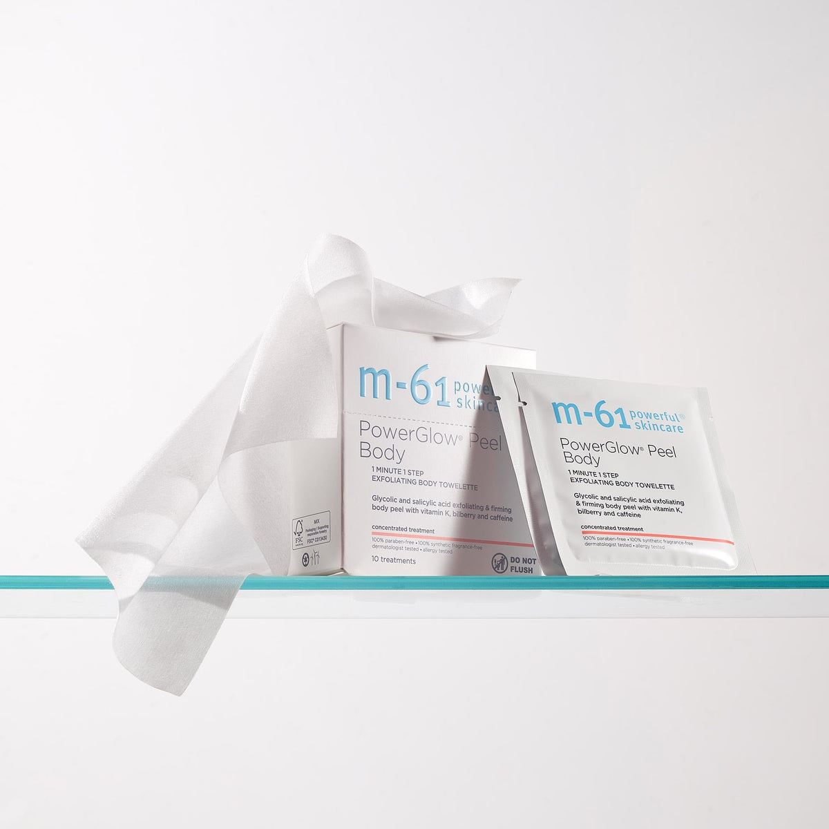 m-61 PowerGlow Peel Body towelette packaging on shelf highlighting convenience and USA-made quality.