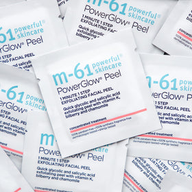 m-61 PowerGlow Peel single pad close-up ready for quick exfoliation.