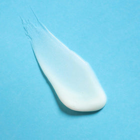 Close-up of m-61 PowerGlow Pro+ Cleanse milky gel texture for gentle exfoliation.