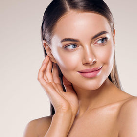 M. Asam Vinolift application on the face and neck for daily firming