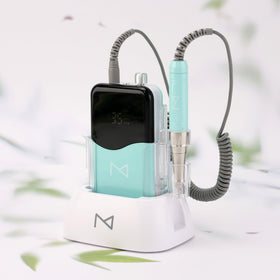 Ergonomic handle supports comfortable use during longer nail sessions.