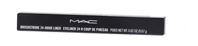 MAC Brushstroke Liner being removed with warm water for gentle cleanup.