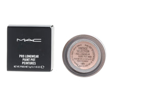 MAC Cham Pale Paint Pot as a lightweight primer for brighter eyelids.