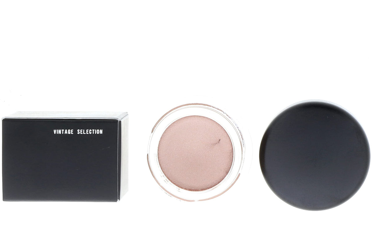 MAC Cham Pale paint pot swatches reveal buildable champagne shade for day or night looks.