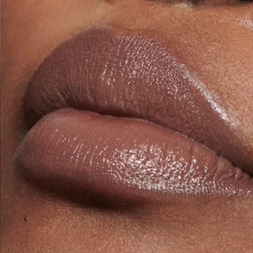MAC M.A.Cximal Sleek Satin Lipstick 838 Stone packaging closeup highlights sleek, premium design.