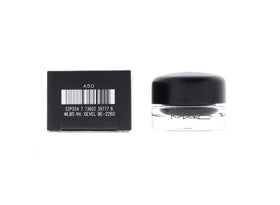MAC Fluidline Blacktrack swatch on skin highlighting creamy gel formula for easy blending.