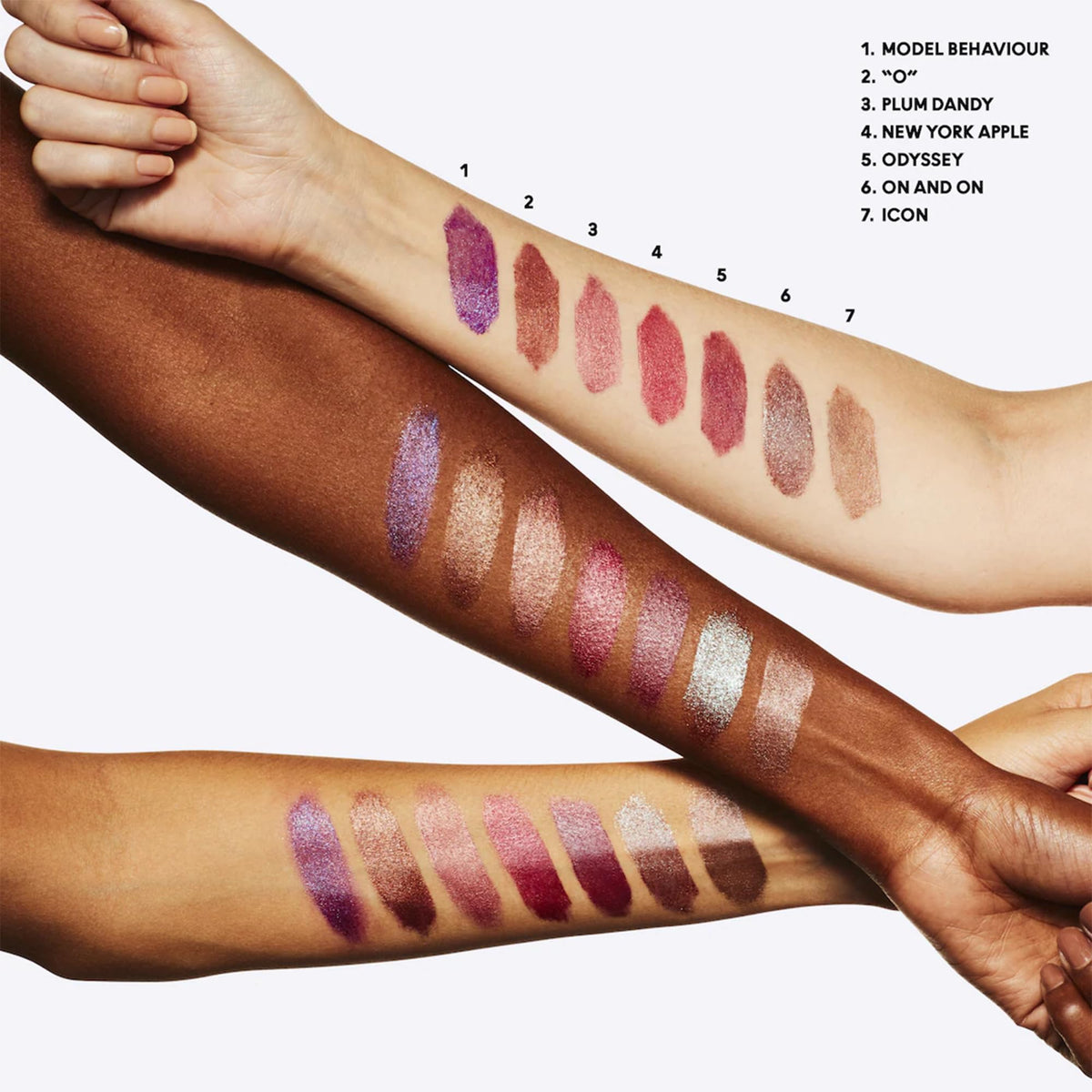 MAC Frost Lipstick Plum Dandy swatch on skin reveals pearlescent shimmer for radiant lips.
