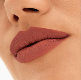 MAC Locked Kiss 24H Lipstick 61 Mischief on lips for everyday bold matte look.