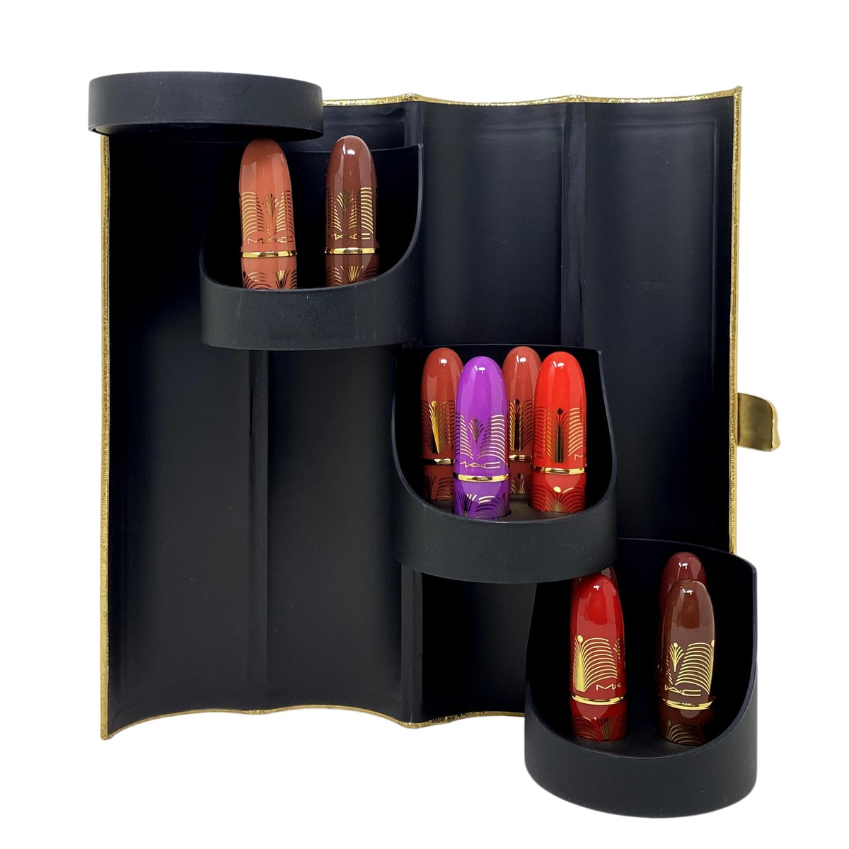 Close-up of Lustreglass shine on mini lipsticks showing glossy finish.