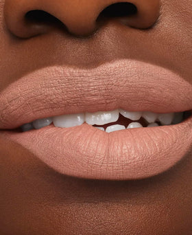 Close-up of lips with non-feathering finish in Honeylove-rose