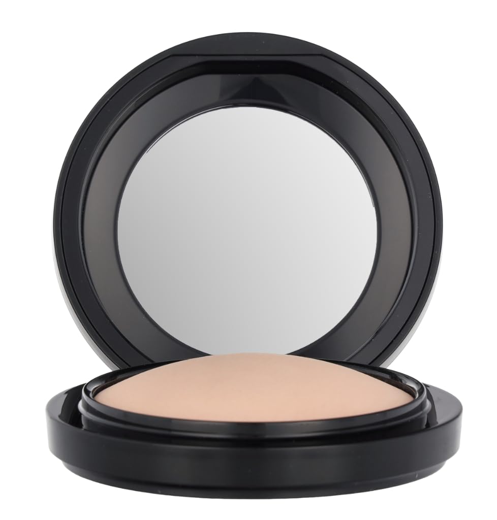 MAC Mineralize Skinfinish Natural Medium Plus pressed powder adds subtle dimension.