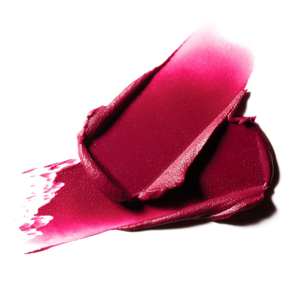 MAC Powder Kiss Liquid Lipcolour swatches reveal deep berry payoff.